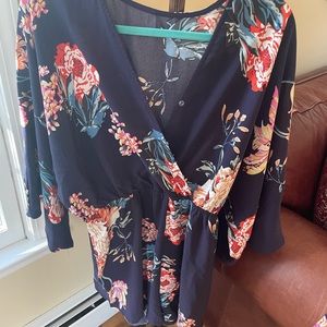 Fun navy romper with flowers and baggy sleeves